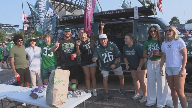 Philadelphia Eagles fans cheer for the team during the tailgate before the first preseason game of the season 