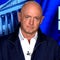 Sen. Mark Kelly says Biden's border policy "was not working" — but Trump has gone too far