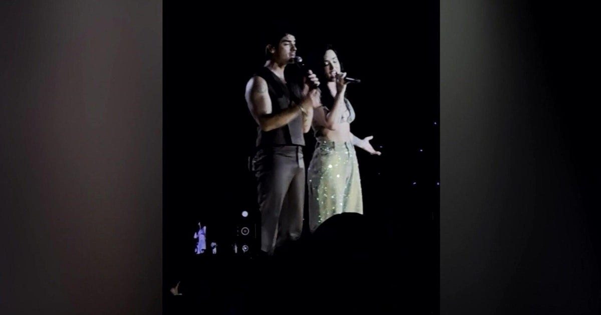 Jonas Brothers surprise MetLife Stadium crowd with guest Demi Lovato 