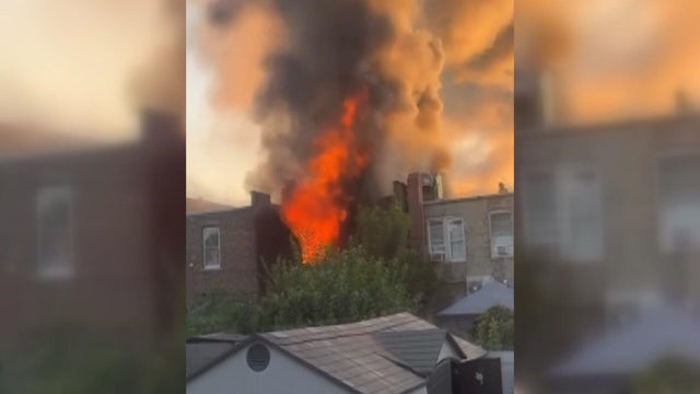 Orange flames and smoke billow into the sky 