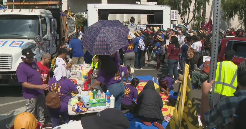 Los Angeles immigrant advocates hold day of protest, boycotts against raids 