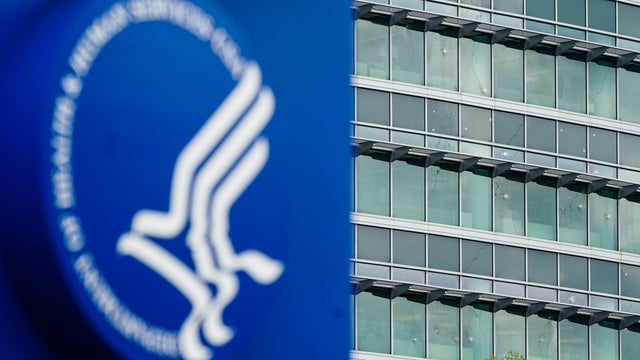 Bullet holes are seen in windows at the CDC in Atlanta after a shooting 