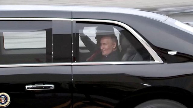 Putin and Trump share a laugh en route to meeting 