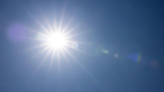 Full bright sun in the sky 