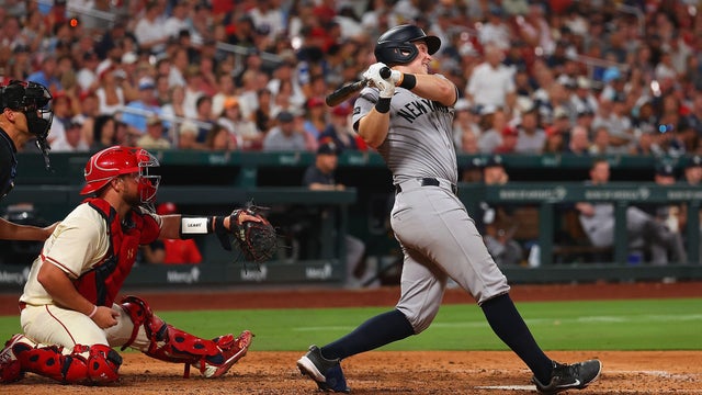Ben Rice #22 of the New York Yankees hits a two-RBI double against the St. Louis Cardinals in the sixth inning at Busch Stadium on August 16, 2025 in St Louis, Missouri. 