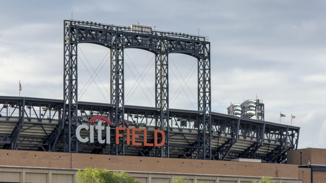 Scenic view of Citi Field stadium against the cityscape in Queens, the United States 