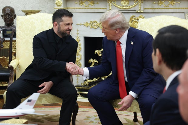 President Trump shakes hands with Ukrainian President Volodymyr Zelenskyy during a meeting in the Oval Office at the White House on Aug. 18, 2025, in Washington, D.C.  