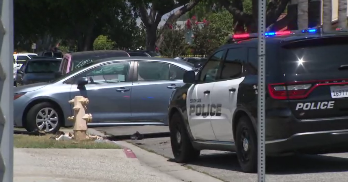 Woman wanted for Huntington Beach business shooting fatally shot by police in L.A. County 