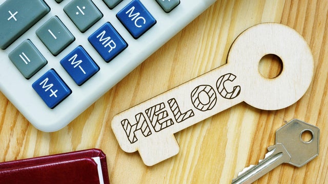 Text sign showing hand written words HELOC 