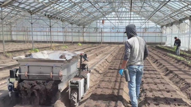 Farmworker monitoring farming technology 