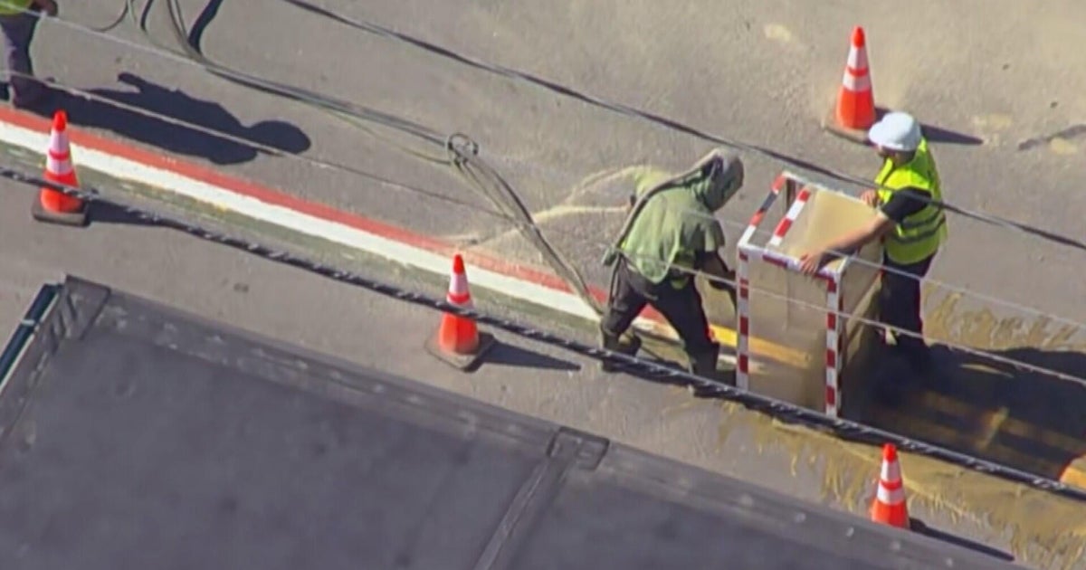 Italian flag colors painted on road in Newton, Massachusetts removed for second time