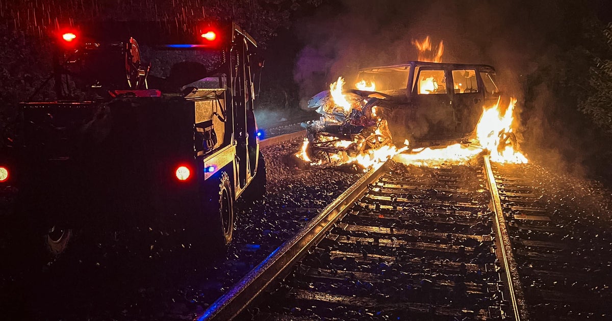 Man seriously injured when freight train hits vehicle in Harvard ...
