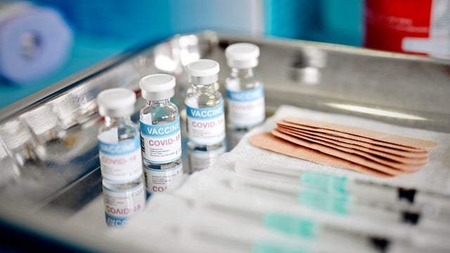 Vials With the Covid-19 Vaccine and Syringes are Displayed On a Tray at the Corona Vaccination Center 
