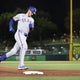 Rangers power past Athletics to win 5-2 
