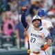 Altuve's homer and Garcia's strong return power the Astros past the Angels, 8-3 