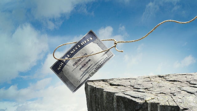 Social security card is teetering on side of cliff 