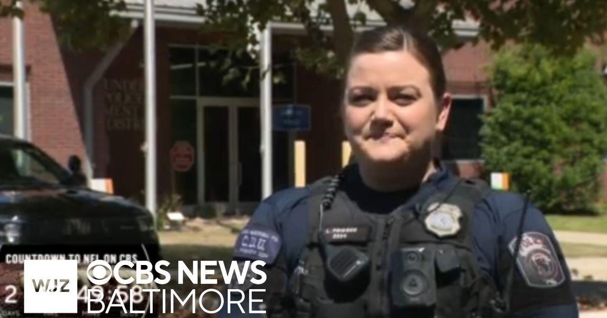 Anne Arundel County officer deemed a hero for saving two lives - CBS ...