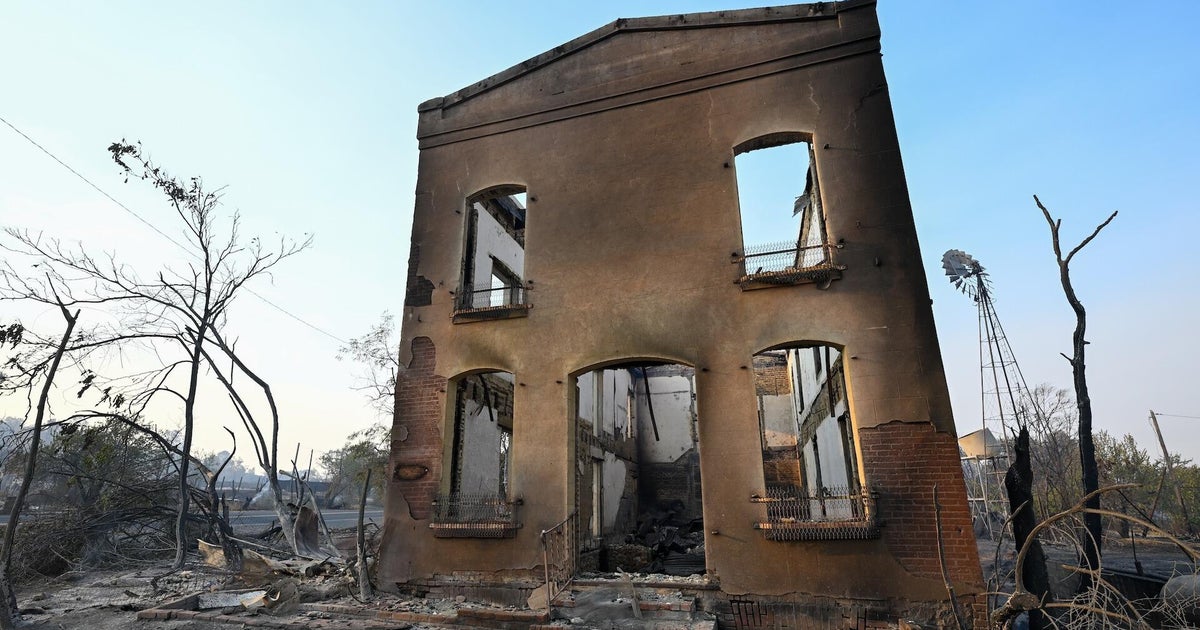 Wildfires spread in historic California town