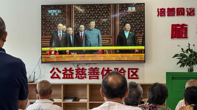 Elderly Residents Watch Victory Day Parade Broadcast In Chongqing 