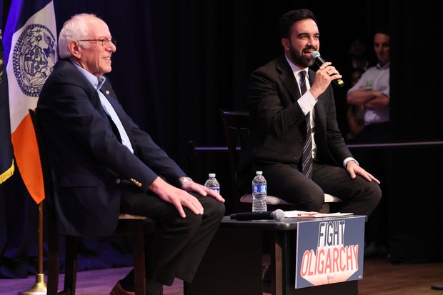 Sen. Bernie Sanders (I-VT) listens as New York mayoral candidate Zohran Mamdani speaks during the Fighting Oligarchy town hall at the Leonard & Claire Tow Center for the Performing Artson September 06, 2025 in New York City. 