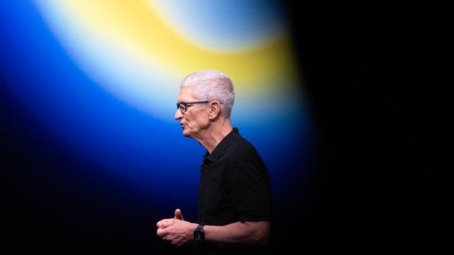 In this photo illustration, the Apple logo "Awe Dropping 