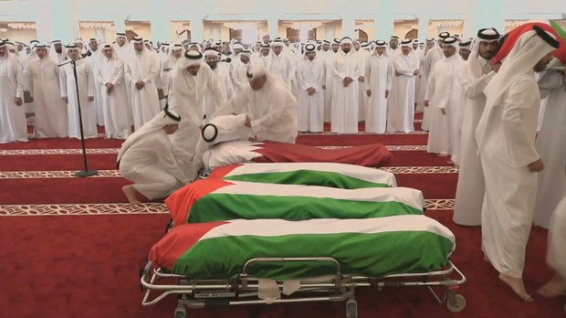People attend a funeral held for those killed by an Israeli attack in Doha 