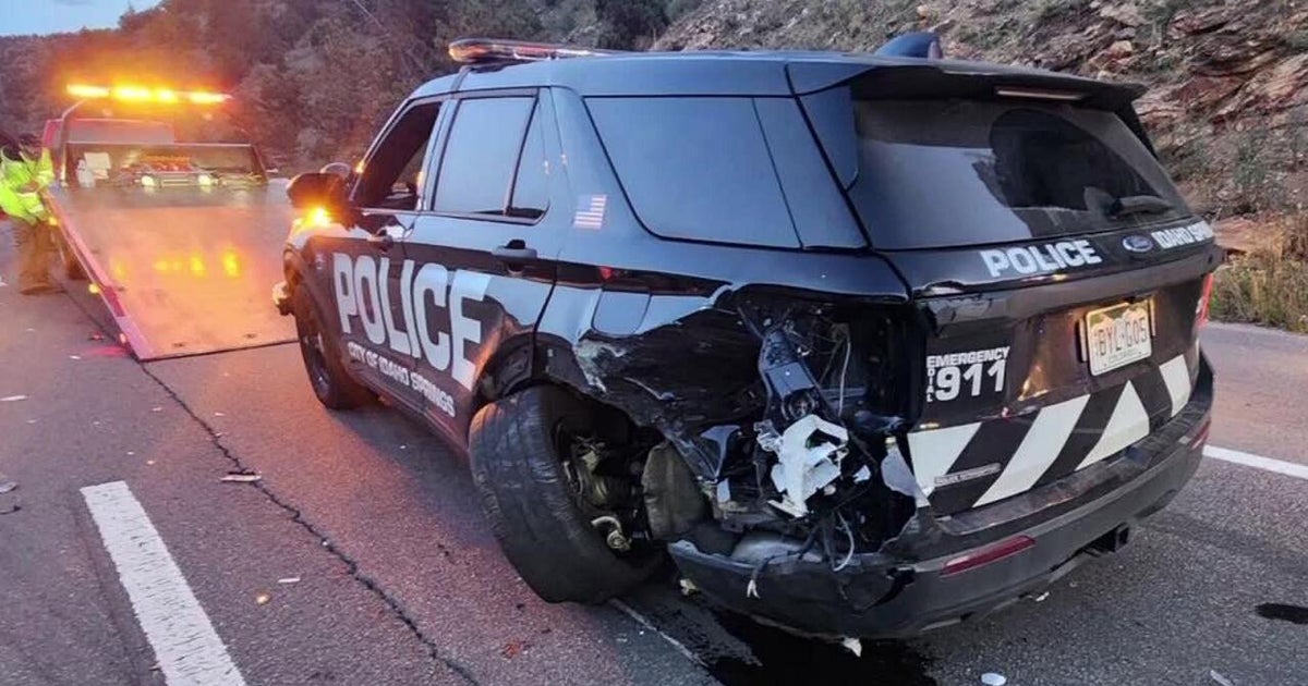 Driver arrested after crashing into Colorado police cruiser on I-70 ...