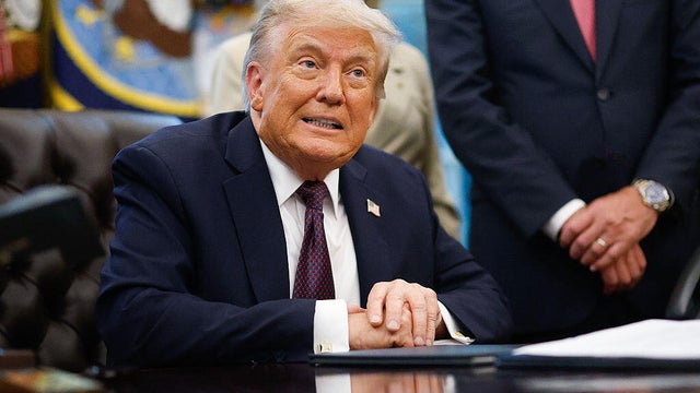 Donald Trump Signs Memorandum In The Oval Office 