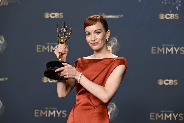 Britt Lower poses with the Emmy 