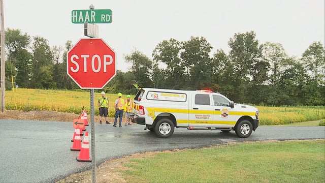 Generic police lights and yellow police tape at crime scene 