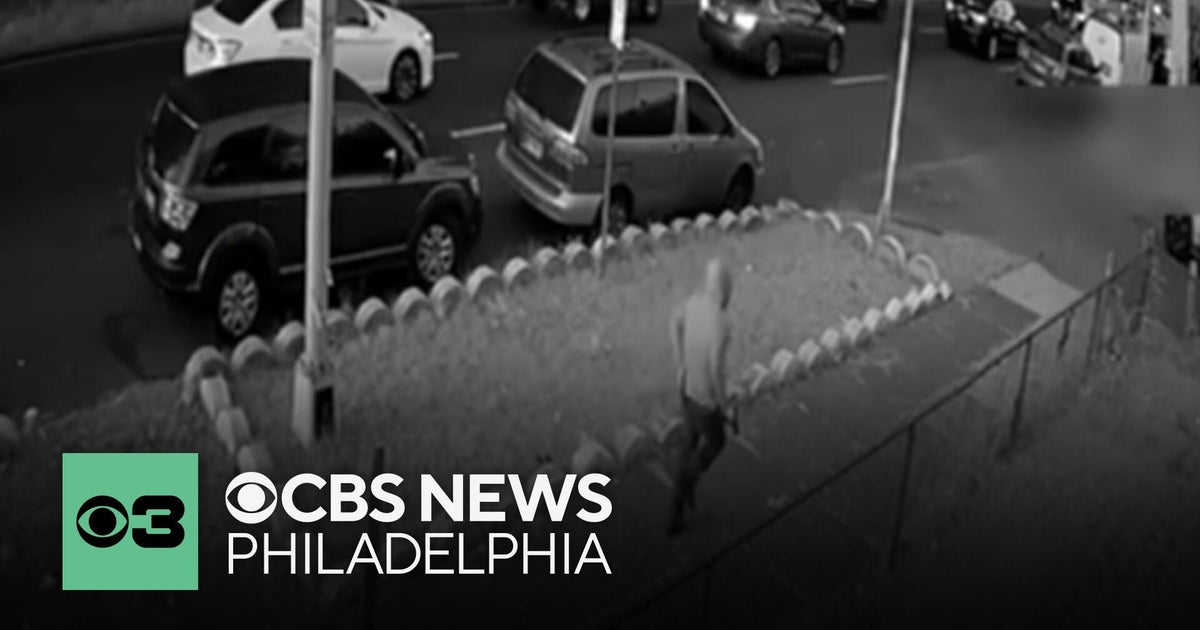 Philadelphia police search for a man seen firing at a fleeing woman 10 ...