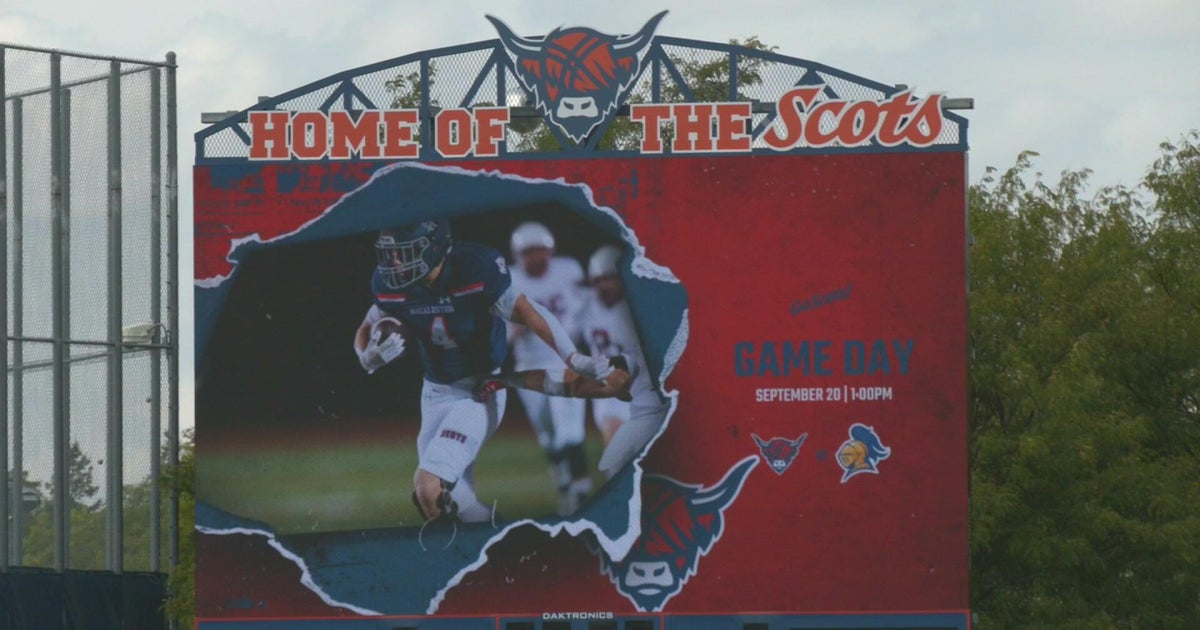 Macalester football battles for repossession of the “Book of Knowledge”