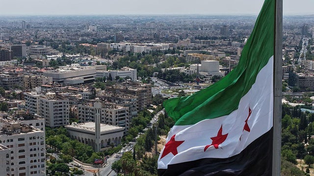 A 600-square-meter Syrian flag is hoisted on a 110-meter pole in Tishreen Park in Damascus on June 4, 2025. 