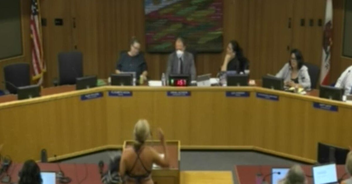 Davis school board meeting take unusual turn when parent undresses during public comment