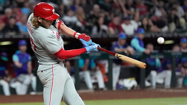 Philadelphia Phillies' Alec Bohm connects for a two-run single against the Arizona Diamondbacks 