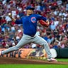 Reds past Cubs 6-3 and within 1 game of final NL wild-card spot at 