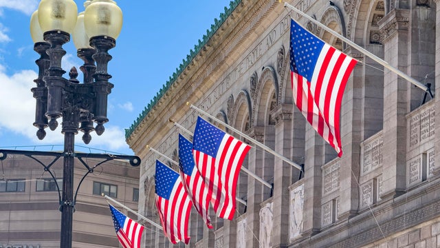 McKim Building, Boston Public Library, building exterior with American flags, Boston, Massachusetts, USA 