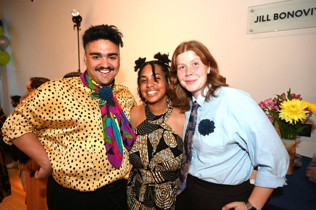 People pose for photos at Mud Ball 2025