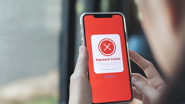 Payment failed, declined. Red online financial transaction notification in application showing error on smartphone. 