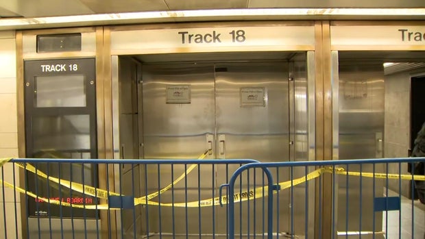 Crime scene tape blocks off LIRR platform doors