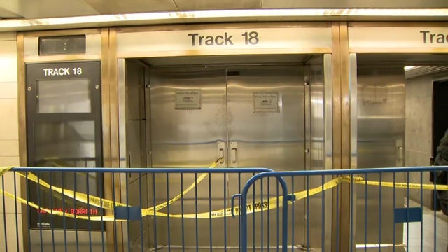 Crime scene tape blocks off LIRR platform doors 