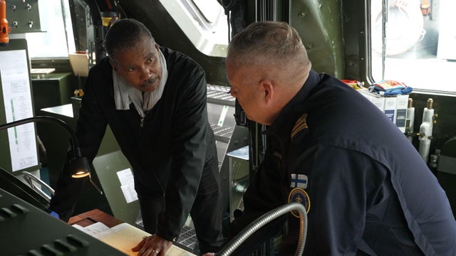 Bill Whitaker with Commander Toni Joutsia 