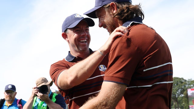 Rory McIlroy and Tommy Fleetwood of Team Europe react after defeating Harris English and Collin Morikawa (not pictured) of Team United States 3&2 during the Saturday morning foursomes matches of the 2025 Ryder Cup at Black Course at Bethpage State Park Golf Course on September 27, 2025 in Farmingdale, New York. 