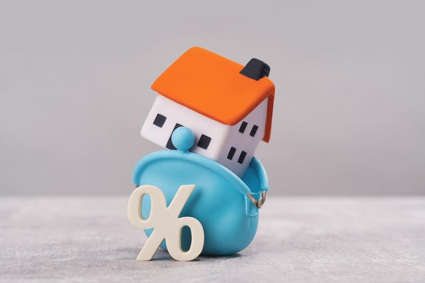 mortgage calculator or real estate business concept 