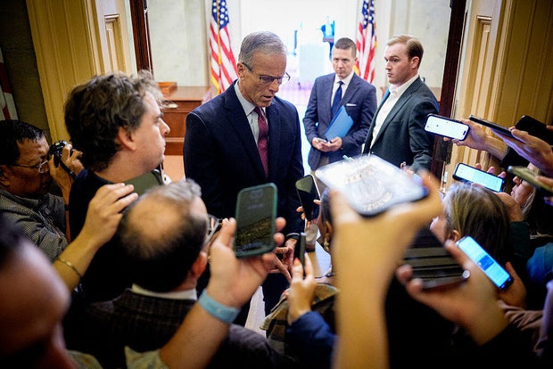 Senate Minority Leader John Thune of South Dakota speaks to reporters at the U.S. Capitol in Washington, D.C., on Oct. 2, 2025. 