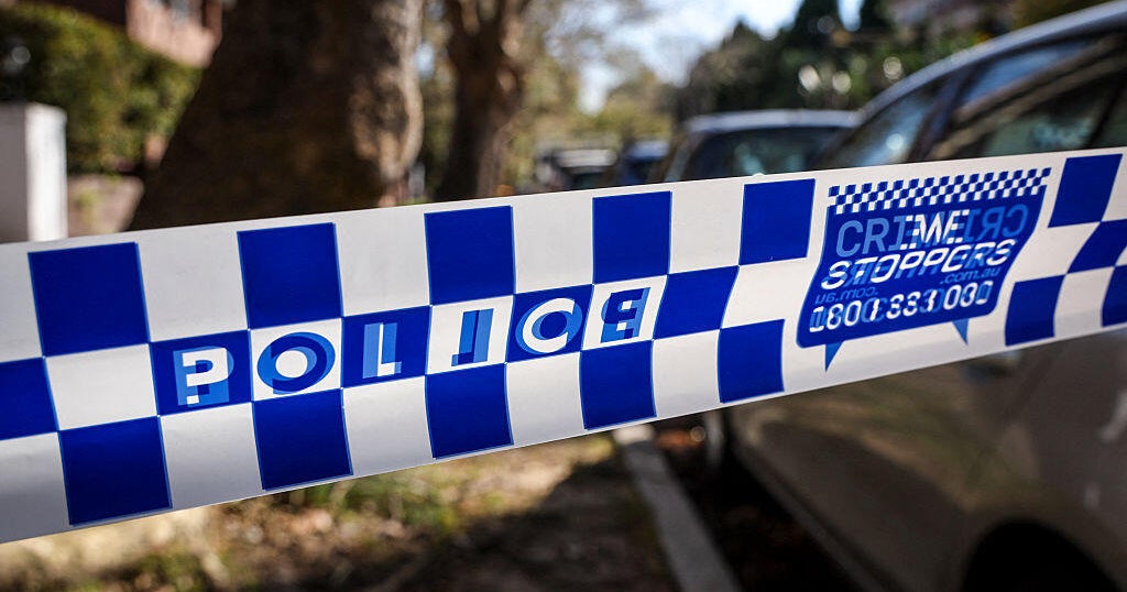 Gunman fired as much as 100 bullets on busy Sydney road at random, injuring 20, police say