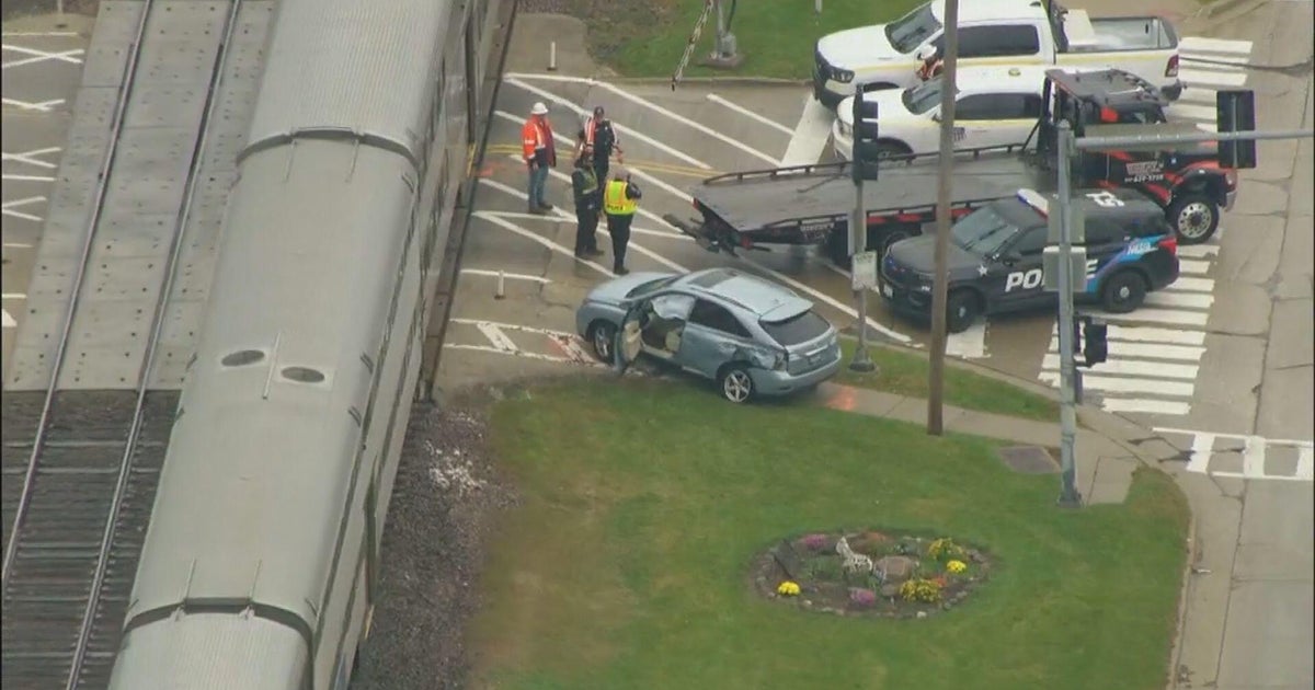 Elderly driver walks away from car struck by Metra UP-NW train in Fox River Grove