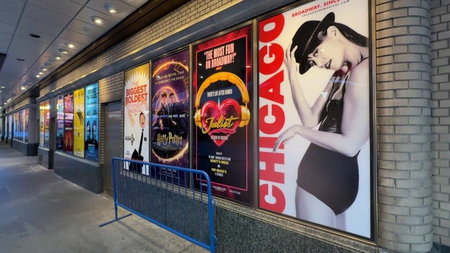 Posters for Broadway shows in New York City's Shubert Alley 
