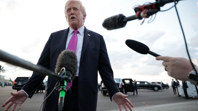 President Trump speaks to members of the press after he landed at West Palm Beach International Airport on October 17, 2025 in West Palm Beach, Florida. 