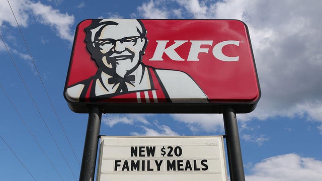 The KFC logo is seen on a sign outside of one of its 